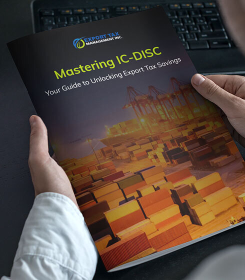 Exporter reading "Mastering IC-DISC - Your Guide to Unlocking Export Tax Savings", of our Export Tax Management team.