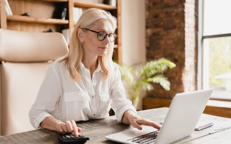 The accountant is calculating how much the tax deductions for her exporter client.