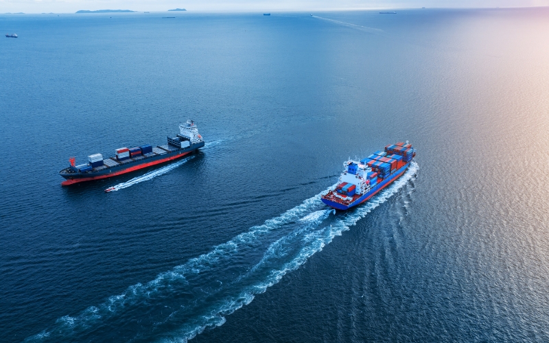 Two vessels sail across the ocean, representing maritime trade and the state tax implications of IC-DISC.