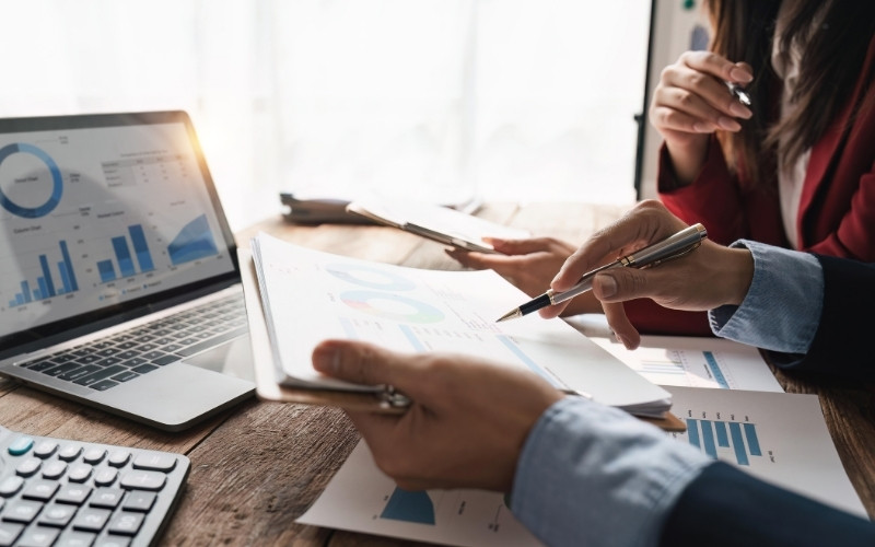 Professionals analyzing foreign processing impacts on IC-DISC export tax qualification.
