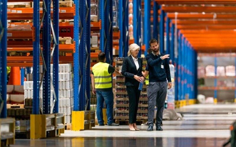 Warehouse team reviewing export operations and supply chain activities for IC-DISC tax benefits.