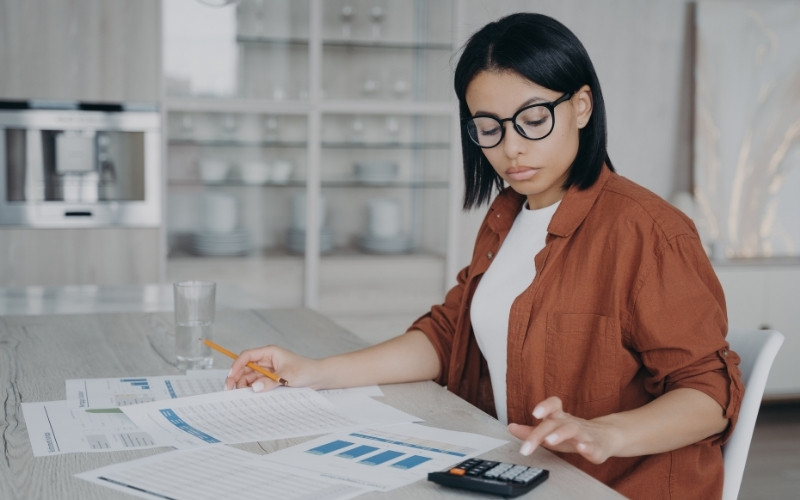 Professional reviewing IC-DISC commission calculations and compliance risk