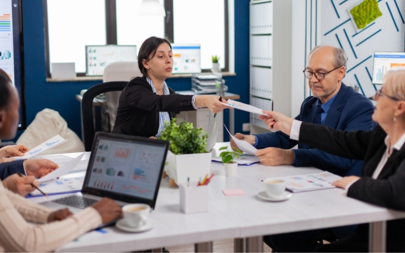 Business team discussing IC-DISC risk management strategies and tax compliance